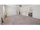 Spacious bedroom with a decorative fireplace, a ceiling fan and an open doorway at 153 Wild Holly Dr, Moncks Corner, SC 29461