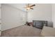 Empty bedroom with a ceiling fan, a window with natural light, and a rustic-style blue dresser at 153 Wild Holly Dr, Moncks Corner, SC 29461