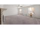 Large bedroom with neutral carpet, a decorative fireplace and lots of natural light at 153 Wild Holly Dr, Moncks Corner, SC 29461
