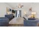 Cozy living room with stylish decor, hardwood floors, and comfortable seating arrangement at 153 Wild Holly Dr, Moncks Corner, SC 29461