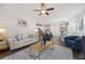 Open concept living area with views of the kitchen, complete with luxury vinyl floors and lots of natural light at 153 Wild Holly Dr, Moncks Corner, SC 29461