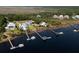 Expansive aerial view showcasing waterfront homes with private boat docks at 1531 Murphys Island Ct, Awendaw, SC 29429