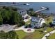 Aerial view of gorgeous home with water views and manicured lawn at 1531 Murphys Island Ct, Awendaw, SC 29429