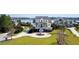 Exterior shot of a beautiful home showcasing a large lawn and circular driveway at 1531 Murphys Island Ct, Awendaw, SC 29429