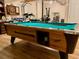 Well-lit game room featuring a pool table and workout equipment at 1531 Murphys Island Ct, Awendaw, SC 29429