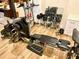 A home gym with a Bowflex machine, weights, and mirrors for workouts at 1531 Murphys Island Ct, Awendaw, SC 29429