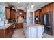 Well-equipped kitchen featuring custom cabinets, stainless steel appliances, and a center island at 1531 Murphys Island Ct, Awendaw, SC 29429