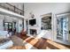 Bright living room with high ceilings, fireplace, and built-in bookshelves at 1531 Murphys Island Ct, Awendaw, SC 29429