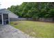 Large backyard with a patio and a wooden fence at 186 Two Pond Loop, Ladson, SC 29456