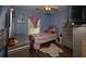 Cozy bedroom with blue walls and natural light from the window at 186 Two Pond Loop, Ladson, SC 29456