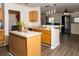 Kitchen featuring modern appliances, ample counter space, and stylish breakfast bar at 186 Two Pond Loop, Ladson, SC 29456