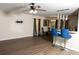 Bright and open living room featuring hardwood floors and modern lighting at 186 Two Pond Loop, Ladson, SC 29456