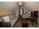Spacious living room featuring vaulted ceilings, a ceiling fan, and a comfortable sofa at 186 Two Pond Loop, Ladson, SC 29456