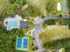 Aerial view of community amenities including a pool, tennis courts, playground, basketball court and parking at 2021 Arundel Pl, Mount Pleasant, SC 29464