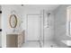 Bright bathroom featuring marble walk-in shower with sleek glass partition and modern vanity at 2021 Arundel Pl, Mount Pleasant, SC 29464