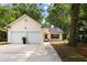Charming home featuring a two-car garage, inviting entrance, and well-maintained landscaping at 2021 Arundel Pl, Mount Pleasant, SC 29464