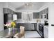 Well-lit kitchen with gray cabinetry, stainless steel appliances, and modern fixtures at 2021 Arundel Pl, Mount Pleasant, SC 29464