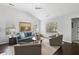 Stylish living room showcases hardwood floors, ample natural light, and comfortable seating at 2021 Arundel Pl, Mount Pleasant, SC 29464