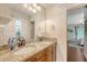 Double vanity bathroom with granite countertops and custom cabinets and decor at 209 Forsythia Ave, Summerville, SC 29483