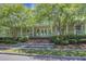 Clubhouse exterior showcasing a welcoming entrance with a brick staircase and manicured landscaping at 209 Forsythia Ave, Summerville, SC 29483