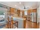 Gourmet kitchen with custom cabinets, stainless appliances, and granite countertops at 209 Forsythia Ave, Summerville, SC 29483