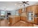 Spacious kitchen with stainless steel appliances, granite countertops, and hardwood floors at 209 Forsythia Ave, Summerville, SC 29483