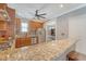 Well-appointed kitchen featuring granite countertops, stainless steel appliances, and custom cabinetry at 209 Forsythia Ave, Summerville, SC 29483