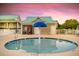 Community splash pad with a mushroom fountain and poolside amenities at sunset at 209 Forsythia Ave, Summerville, SC 29483