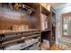 Walk-in closet featuring custom shelving, drawers, rods and a full length mirror at 209 Forsythia Ave, Summerville, SC 29483