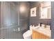Modern powder room with stylish sink and marble countertop at 21 1/2 Pitt St, Charleston, SC 29401