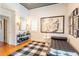 Bedroom featuring modern art, sleek furniture, and abundant natural light at 21 1/2 Pitt St, Charleston, SC 29401
