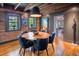 Dining area featuring a hardwood floor, and exposed beam ceilings, and natural light at 21 1/2 Pitt St, Charleston, SC 29401
