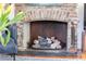 Close-up of the brick fireplace showcasing its unique design and texture at 21 1/2 Pitt St, Charleston, SC 29401