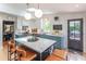Spacious kitchen with a center island, stylish pendant lighting, and stainless steel appliances at 21 1/2 Pitt St, Charleston, SC 29401