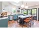 Bright kitchen with a center island, and stainless steel appliances at 21 1/2 Pitt St, Charleston, SC 29401