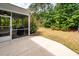 View of back porch and yard featuring lawn, landscaping, fencing and an outdoor area for relaxing at 2119 Oyster Reef Lane Ln, Mount Pleasant, SC 29466