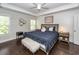 Inviting bedroom with hardwood floors, decorative walls, and large bed for comfort and style at 2119 Oyster Reef Lane Ln, Mount Pleasant, SC 29466