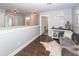 Open hallway with wood floors, complemented by a stylish decor and soft natural light at 2119 Oyster Reef Lane Ln, Mount Pleasant, SC 29466