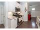 Close up of kitchen with stainless steel range, white cabinets, and granite countertops at 2119 Oyster Reef Lane Ln, Mount Pleasant, SC 29466