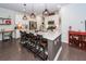Stylish kitchen featuring an island with barstool seating and modern pendant lighting at 2119 Oyster Reef Lane Ln, Mount Pleasant, SC 29466