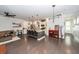 Bright, open-concept living space with a kitchen island and hardwood floors at 2119 Oyster Reef Lane Ln, Mount Pleasant, SC 29466