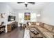 Bright living room featuring hardwood floors, neutral walls, and a comfortable sectional sofa at 2119 Oyster Reef Lane Ln, Mount Pleasant, SC 29466