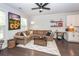 Open-concept living area with stylish furnishings, hardwood floors, and a seamless flow to the kitchen at 2119 Oyster Reef Lane Ln, Mount Pleasant, SC 29466