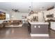 Open-concept living space with eat-in kitchen island and comfortable, modern furnishings at 2119 Oyster Reef Lane Ln, Mount Pleasant, SC 29466