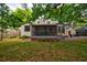 Back of home with screened-in porch and well maintained backyard at 2169 Westrivers Rd, Charleston, SC 29412