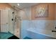 Modern bathroom with glass-enclosed shower, bathtub, and sleek fixtures at 2169 Westrivers Rd, Charleston, SC 29412