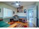 Cozy bedroom with natural light and a ceiling fan at 2169 Westrivers Rd, Charleston, SC 29412