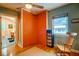 Bedroom with a view of the bathroom, rocking chair, and closet at 2169 Westrivers Rd, Charleston, SC 29412