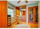 Bedroom featuring a rocking chair, closet, and window at 2169 Westrivers Rd, Charleston, SC 29412