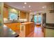 Charming kitchen with custom cabinets, stainless steel appliances, a butcher block island, and seamless flow at 2169 Westrivers Rd, Charleston, SC 29412